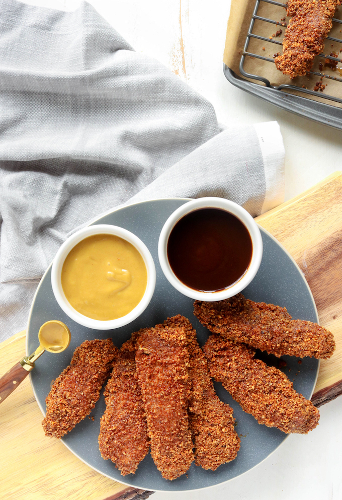 Baked Pecan Crusted Chicken Tenders are a fun (and healthy) twist on a traditional American classic. A prep-ahead option and short ingredient list make this the perfect weeknight meal.