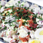 Healthy-ish Roasted Potato Salad is loaded with the perfect combination of crispy pancetta, creamy eggs, fresh herbs and a tangy greek yogurt dressing.