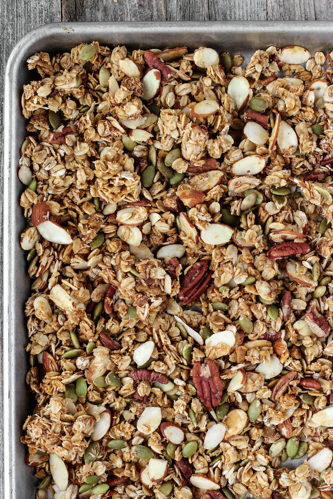 Pumpkin Spice Granola with toasted oats, pecans, sliced almonds, pepita seeds. Naturally sweetened with a combination of honey, maple syrup and pumpkin puree.