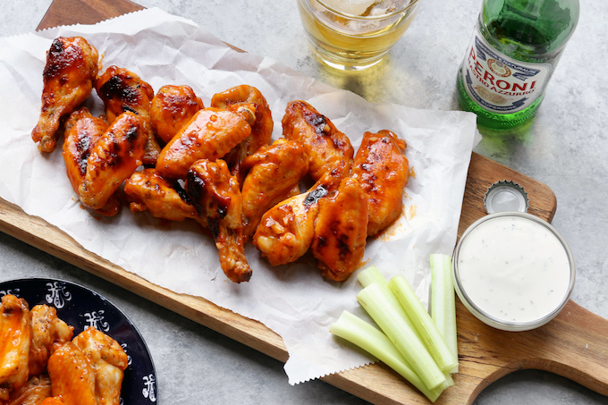 These easy to make Whole Food Hot Wings are crispy without being fried. Just 6 ingredients and 5 minutes prep time required. Perfect for game day, an appetizer or a quick and simple dinner!