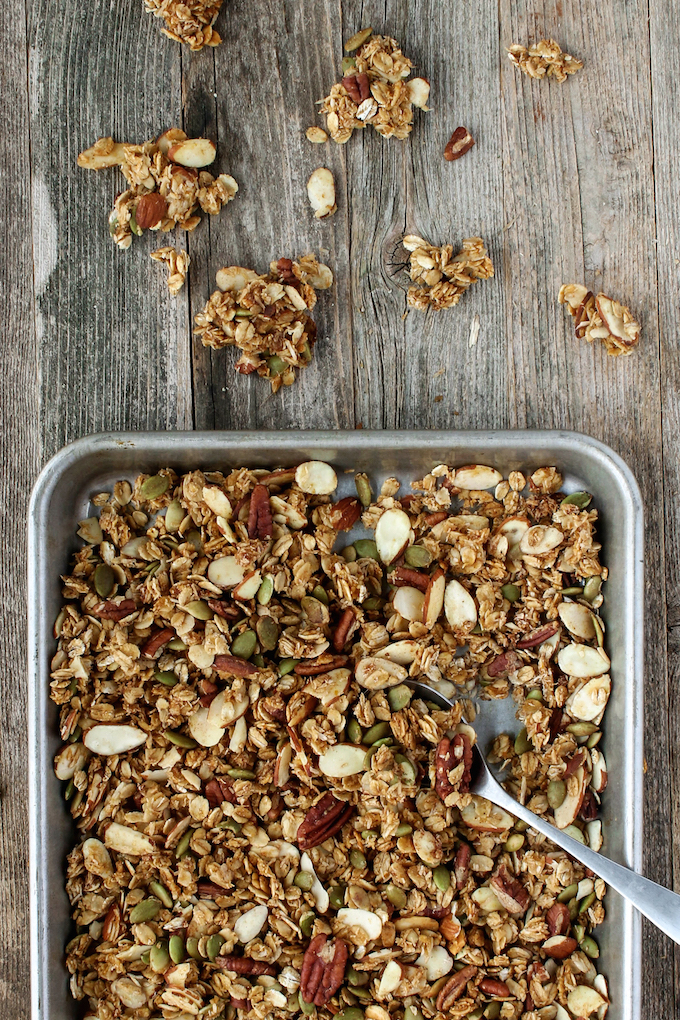 Pumpkin Spice Granola with toasted oats, pecans, sliced almonds, pepita seeds. Naturally sweetened with a combination of honey, maple syrup and pumpkin puree.