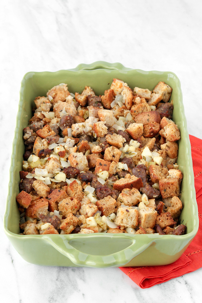 Simple Whole-Food Apple Sausage Stuffing with 3 types of bread, tart granny smith apples, spicy sausage and plenty of fresh herbs!