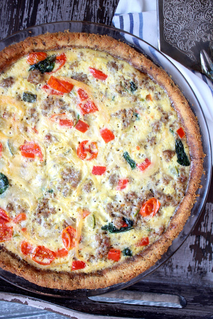 Sausage and Veggie Quiche with Almond Meal Crust - A delicious low-carb alternative to traditional crust! Homemade turkey sausage, seasonal veggies, and melty swiss cheese ... yes please!