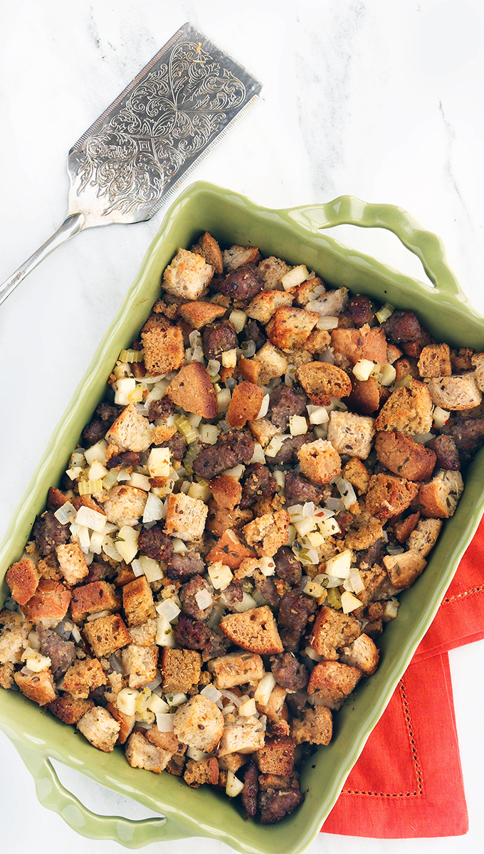 Simple Whole-Food Apple Sausage Stuffing with 3 types of bread, tart granny smith apples, spicy sausage and plenty of fresh herbs!