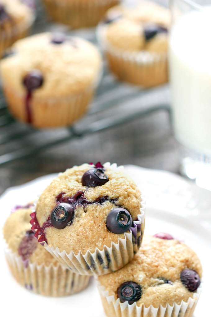 These whole-grain blueberry muffins are made with wholesome whole wheat and almond flours, fresh blueberries, and pure maple syrup.