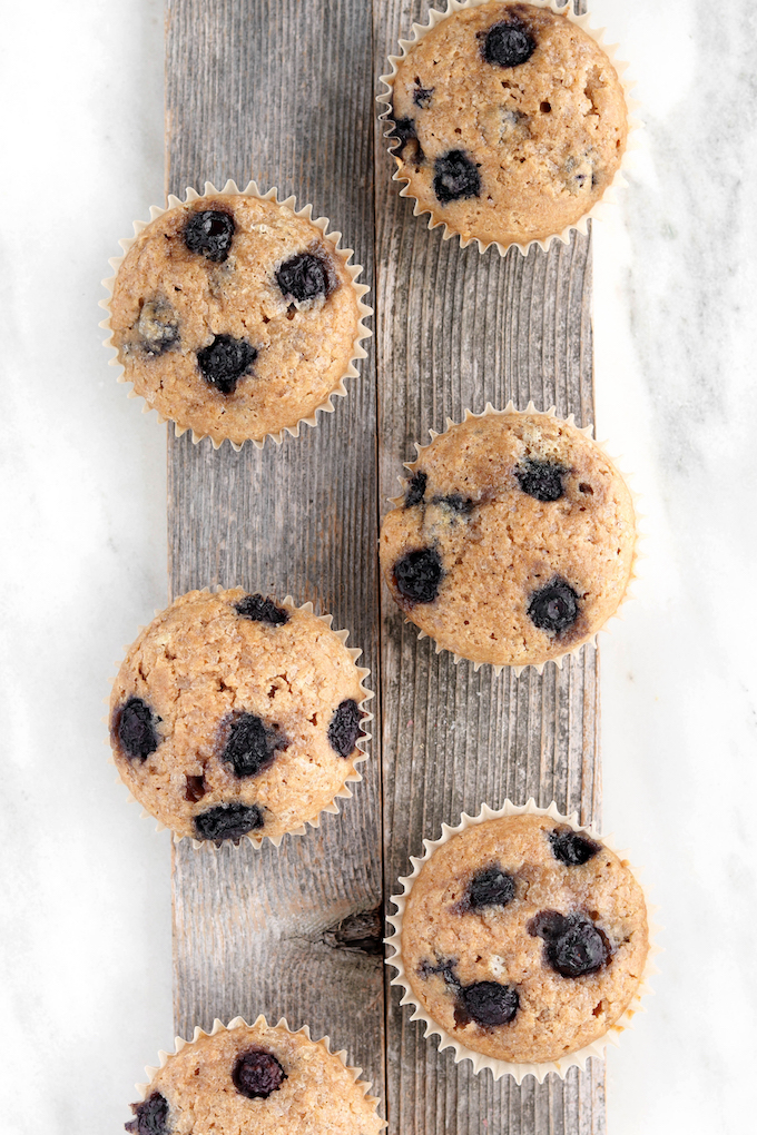One-bowl Blueberry Muffins that are whole-grain, naturally sweetened, healthy and seriously delicious.