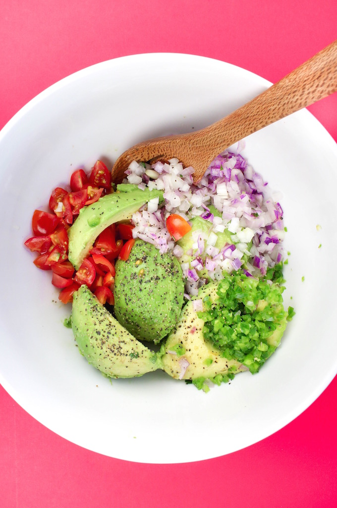 Creamy mashed avocado combined with lemon and lime citrus juice, tomato, onion, fresh cilantro, spicy jalapeno and seasoning.. Yep good ol' Super Simple 5-Minute Guacamole!