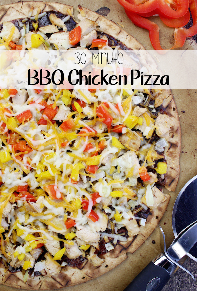 The best and easiest BBQ Chicken Pizza with a whole wheat crust, tangy bbq sauce, loads of seasoned chicken and melty cheeses too!