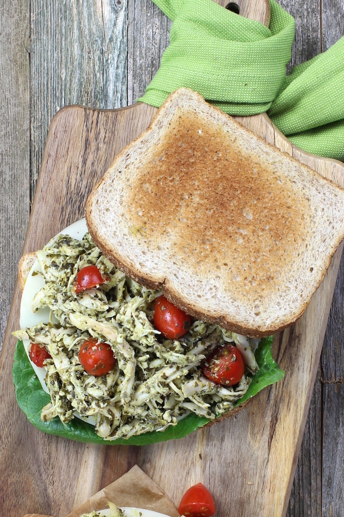 Easy 3 Ingredient chicken salad made with pesto and shredded chicken and made creamy with a dollop of Greek yogurt. A simple, healthy and flavorful twist on a traditional classic.