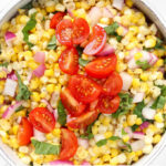10-Minute Fresh Corn Salad in a white bowl.