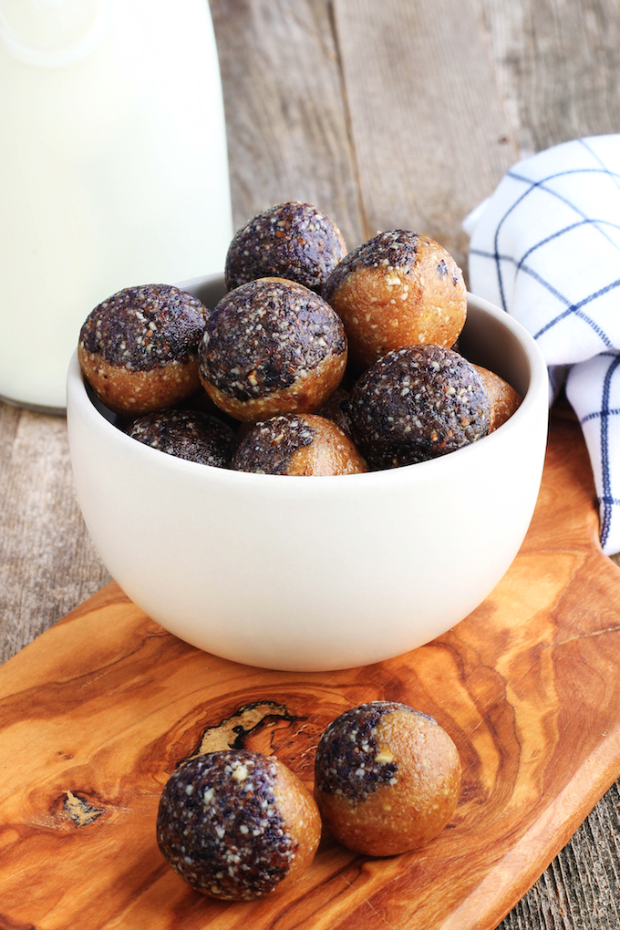 Peanut Butter and Jelly Energy Balls are a healthy little snack that is simple to make, requiring just 30 minutes and 1 bowl. Nutrient dense to keep you fueled throughout the day and to help fight cravings. #glutenfree #plantbased #vegan #wholefood