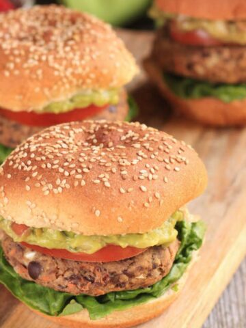 The best veggie burgers on a wood serving platter.