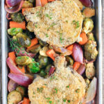 3 Ingredient Sheet Pan Pork Chops with Harvest Veggies is a healthy whole-food meal featuring roasted fall veggies tossed in a simple honey-dijon balsamic dressing.