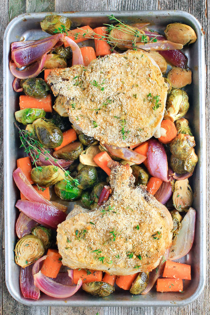3 Ingredient Sheet Pan Pork Chops with Harvest Veggies is a healthy whole-food meal featuring roasted fall veggies tossed in a simple honey-dijon balsamic dressing.
