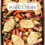 3-Ingredient Sheet Pan Pork Chops with Balsamic Glazed Vegetables arranged on a sheet pan.