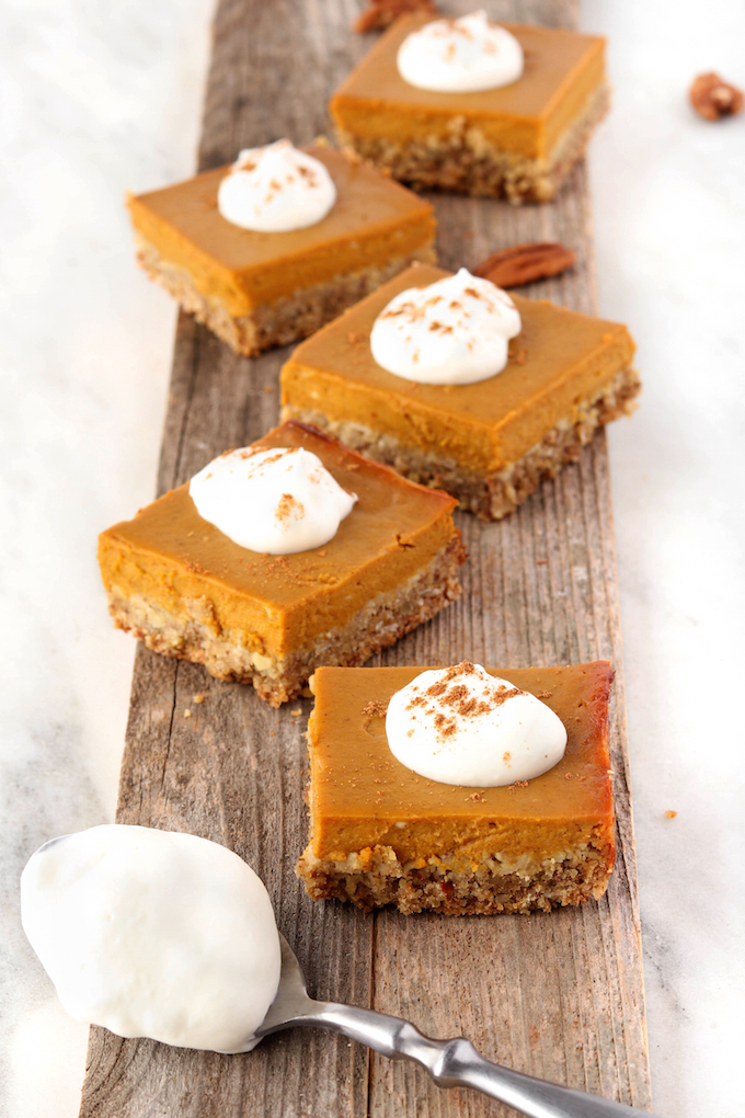Hearty Pumpkin Pie Bars are a fun twist on traditional pumpkin pie. Crunchy oat n' almond crust topped with classic pumpkin filling. #wholefood #glutenfree
