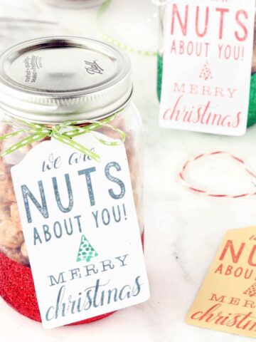 Honey Roasted Almonds in glass jar with gift tag.