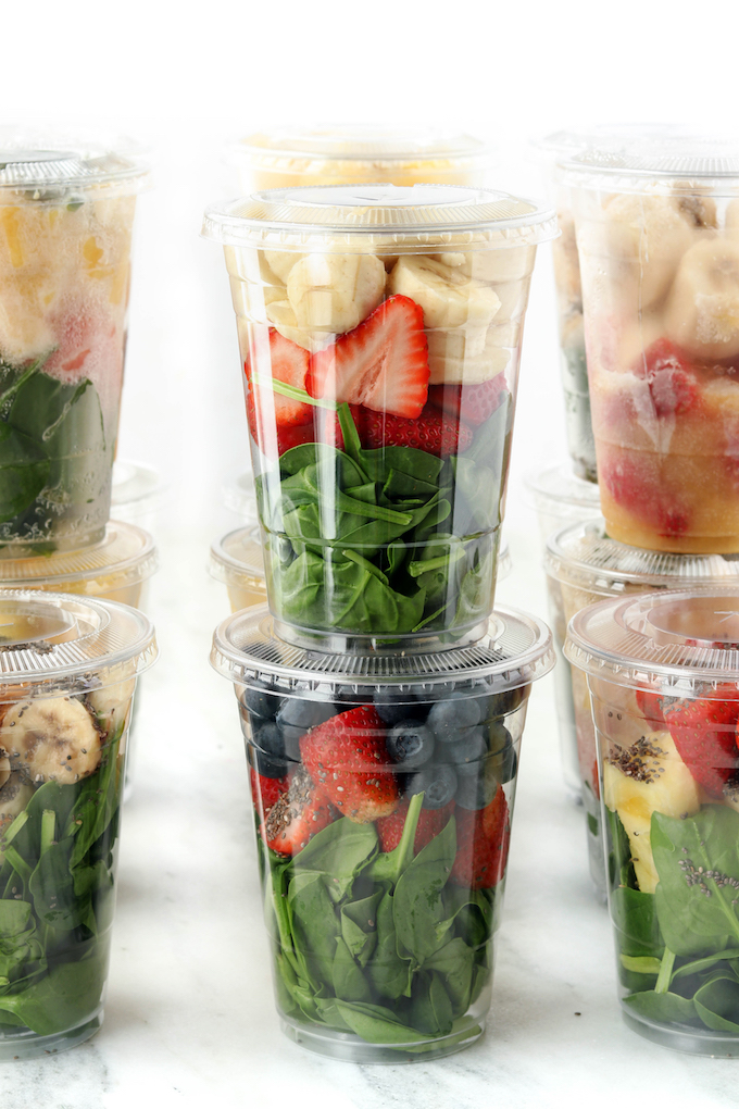 Simple tips and tricks on how to batch prep grab n' go smoothies quickly. Make them in advance, and enjoy them for the week, or even the whole month!