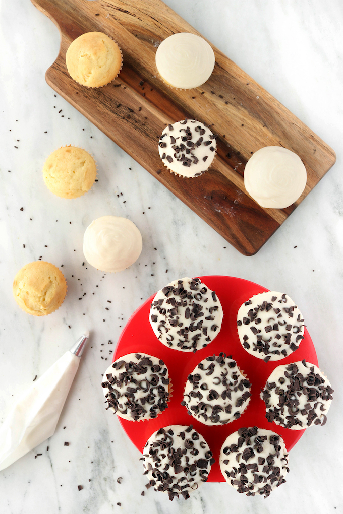 Simple Yellow Cupcakes with Homemade Frosting that taste so much better than the boxed version! Fluffy, sweet, and free from dyes and other artificial ingredients. 