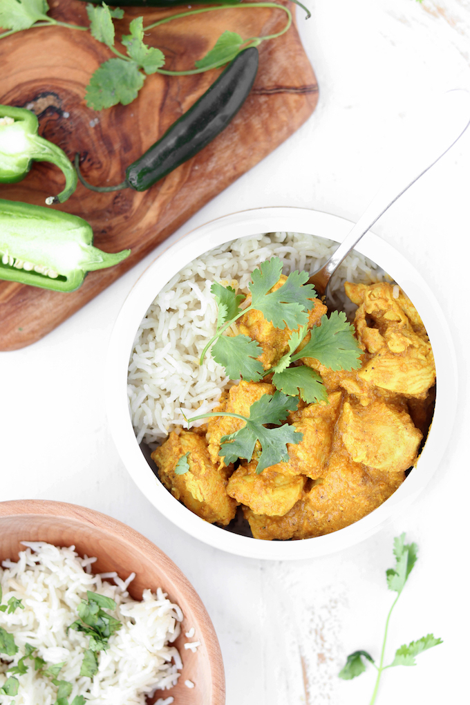 30 Minute, 1 pot Lightened Chicken Tikka Masala with green chili, cilantro, and garam masala. Flavorful, not too spicy and make ahead friendly. A healthy, real food meal.