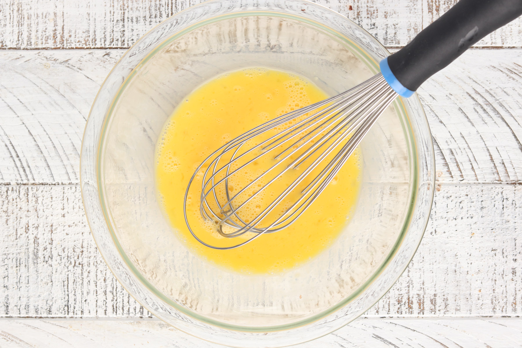 Step 3: Sausage Carbonara - whisk eggs and parmesan.