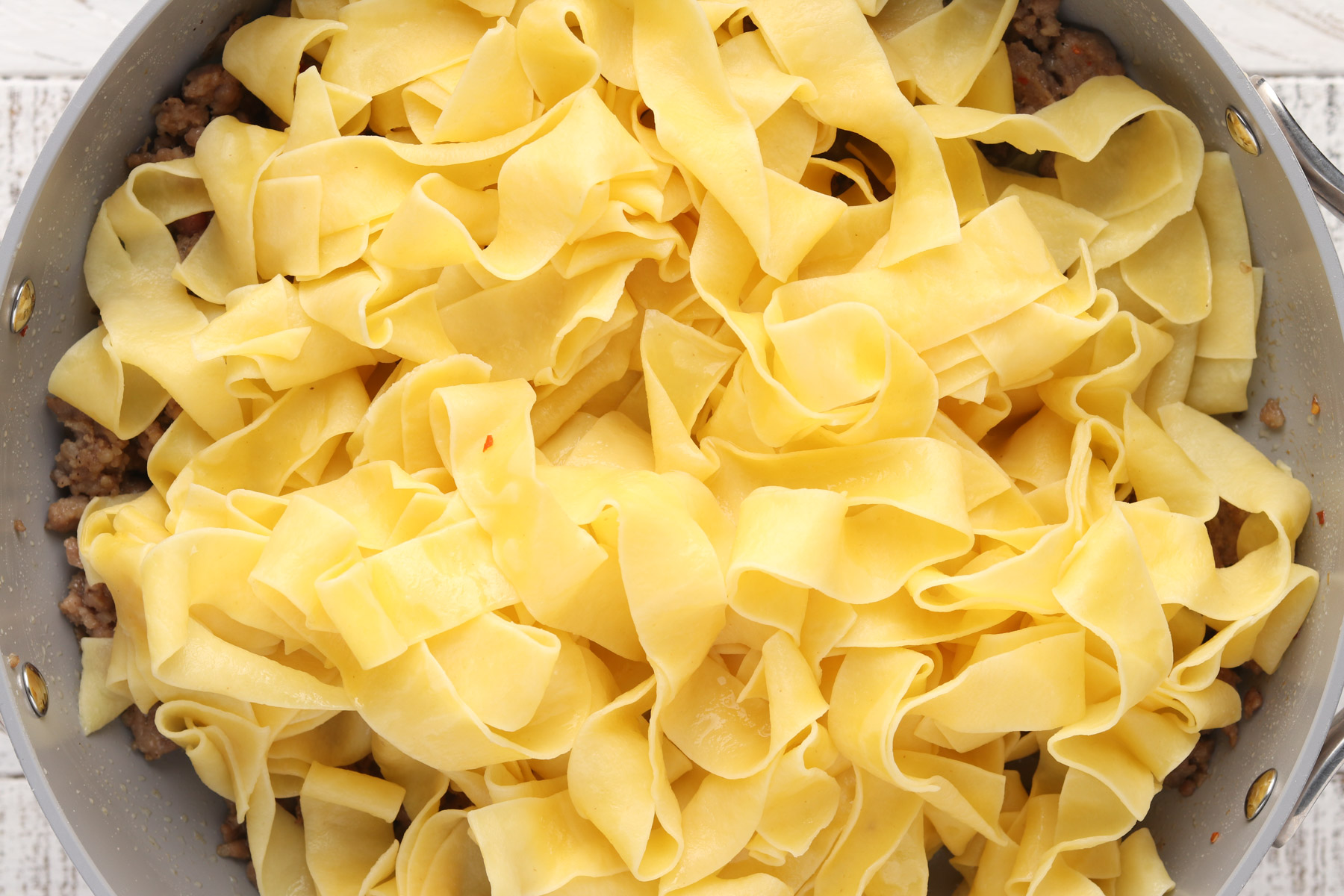 Step 4: Sausage Carbonara - Add noodles to pan.