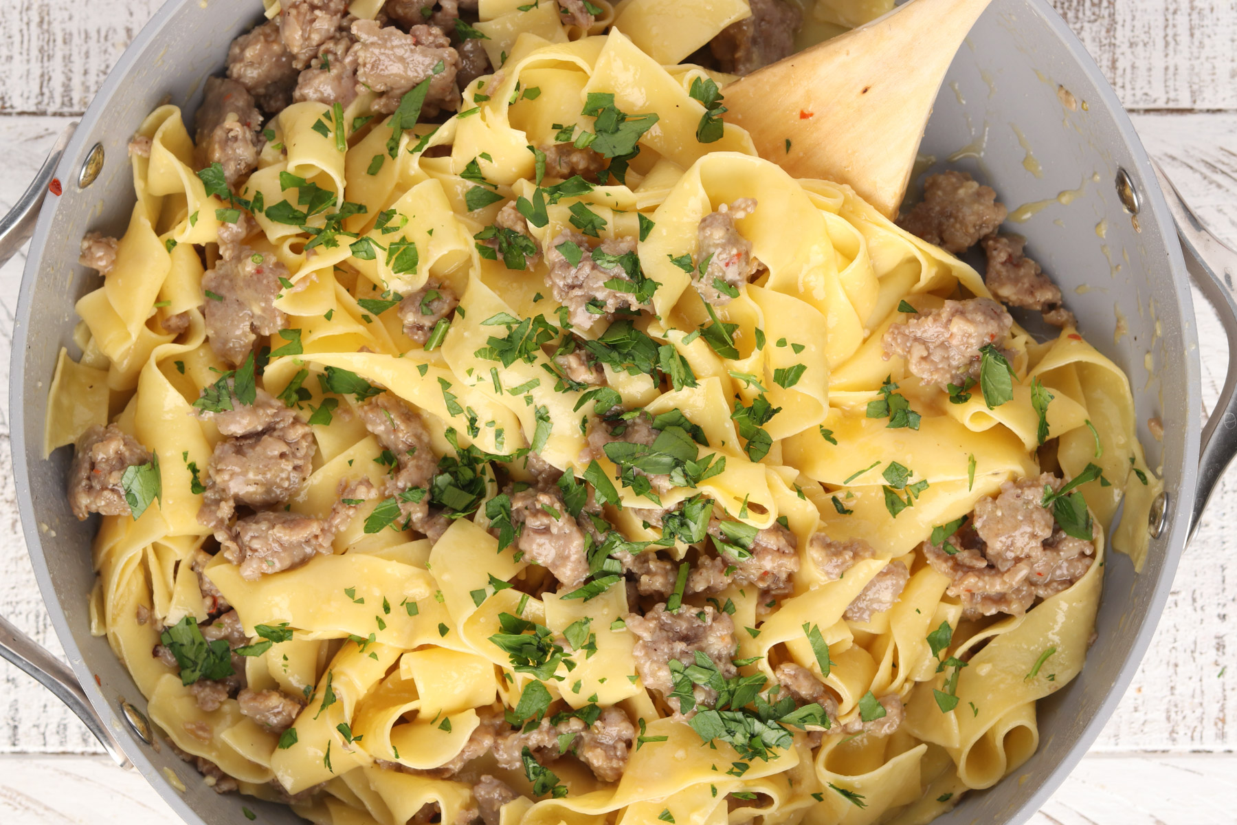 Step 6: Sausage Carbonara - add parsley for garnish and serve.