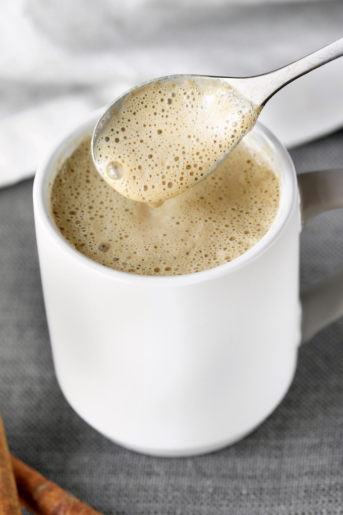 5 Minute Pumpkin Spice Cashew Coffee that's creamy, real food friendly, and subtly spiced. Homemade salted pumpkin spice syrup gives it depth, flavor and warmth, while a medjool dates adds just the right amount of sweetness.