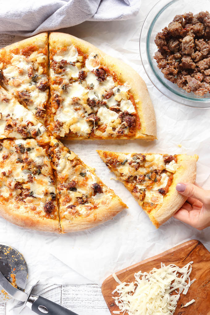 Ultimate Pumpkin Pizza on white parchment paper.