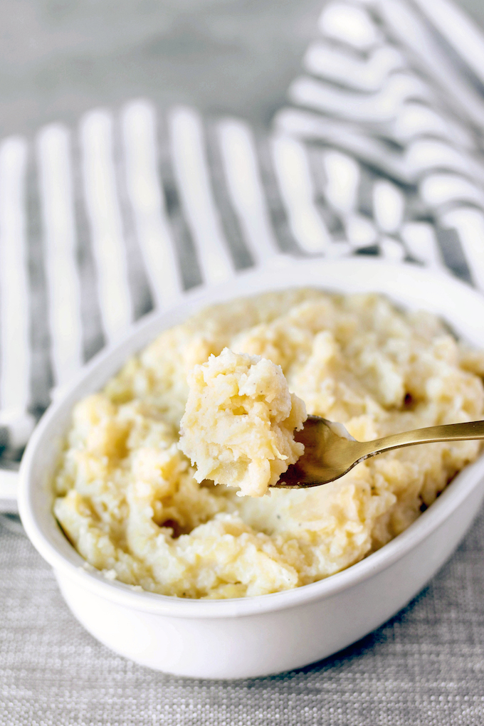 Simple Mashed Potatoes are easy to make, requiring only 5 basic ingredients. Gold potatoes, milk, butter, salt and pepper come together making this classic all-time favorite easier than ever to whip together.