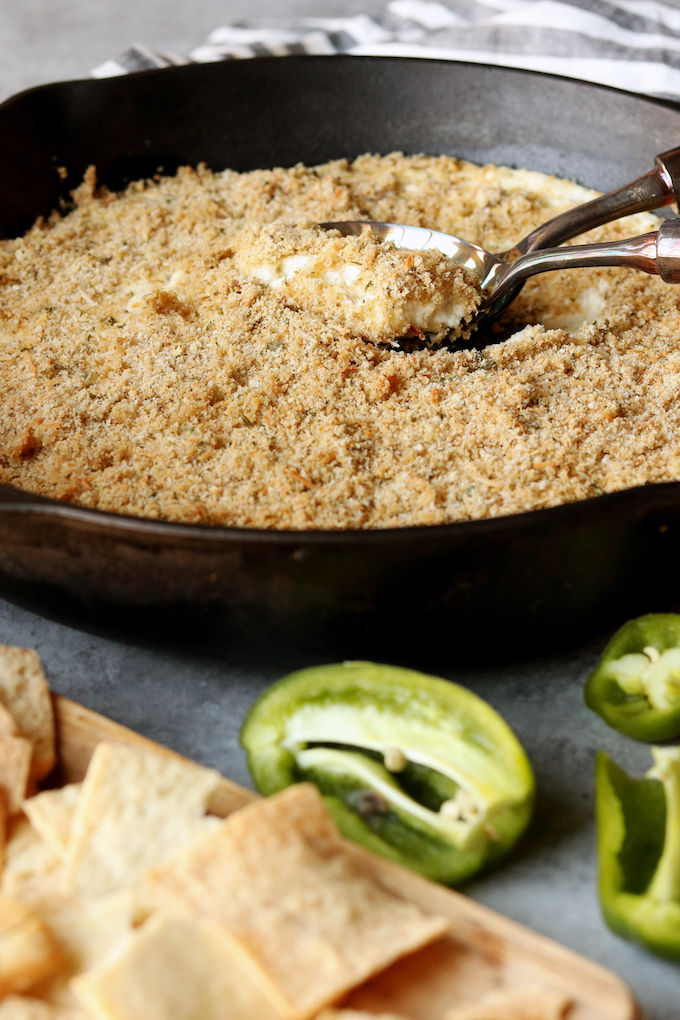 Easy, 8-ingredient cheesy Lightened Up Jalapeño Popper Dip with just the right amount of spice. The perfect 5-minute throw together dip for any get together.