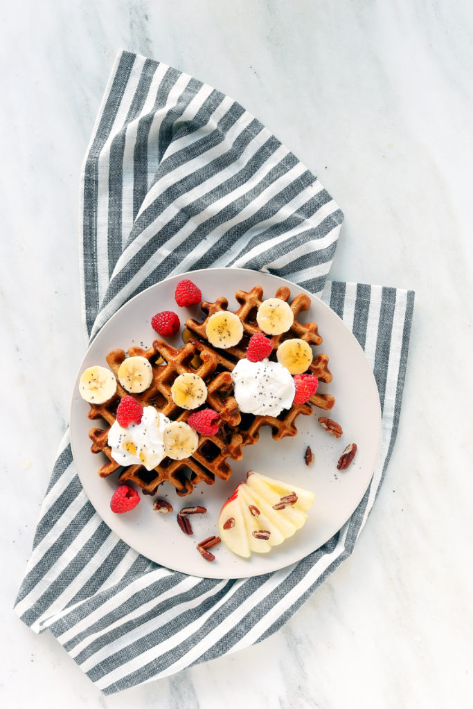 Simple, Freezer-Friendly Whole Wheat Gingerbread Waffles that are crisp on the outside and tender inside. A perfect healthy, quick and festive breakfast.