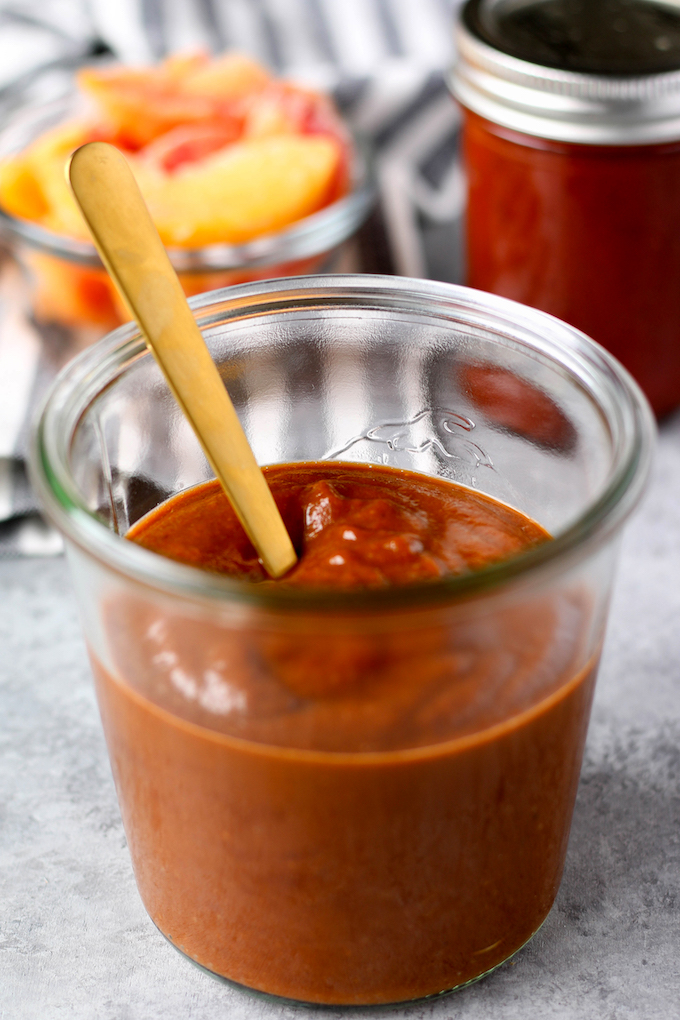 Tangy, savory Whole30 Chipotle Peach BBQ Sauce is simple to make, and naturally sweetened. Perfect for adding to pulled chicken, pizza, burgers and everything else in between!