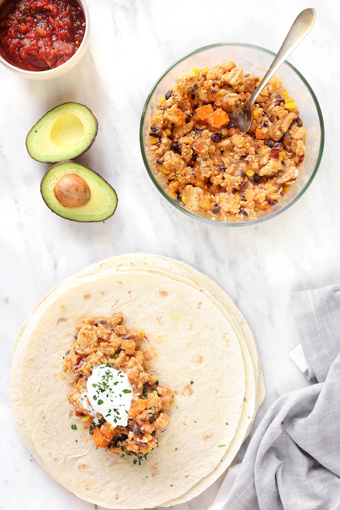 Freezer-Friendly Chicken Chipotle Burritos are simple to make, requiring just 30 minutes and basic ingredients. The perfect grab-n-go dinner to have hanging around for nights when life gets busy!