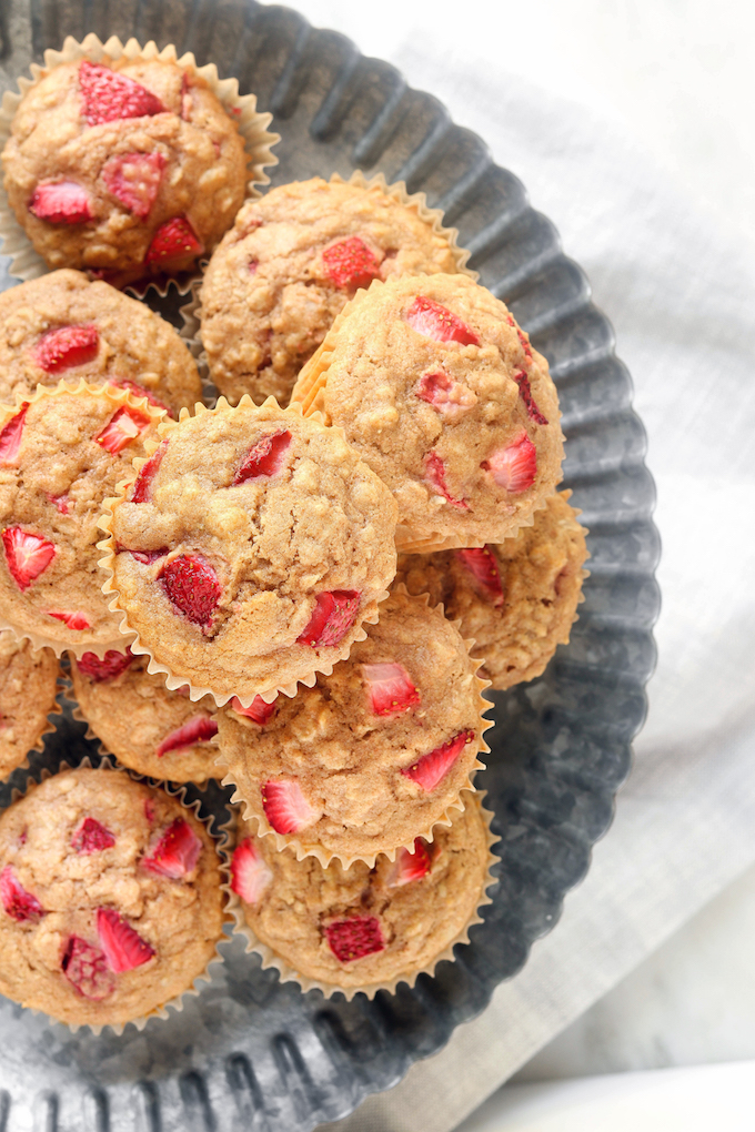 Thick n' fluffy, perfectly sweet Strawberry Oatmeal Muffins are flavorful and naturally sweetened. The perfect grab n' go breakfast or snack!