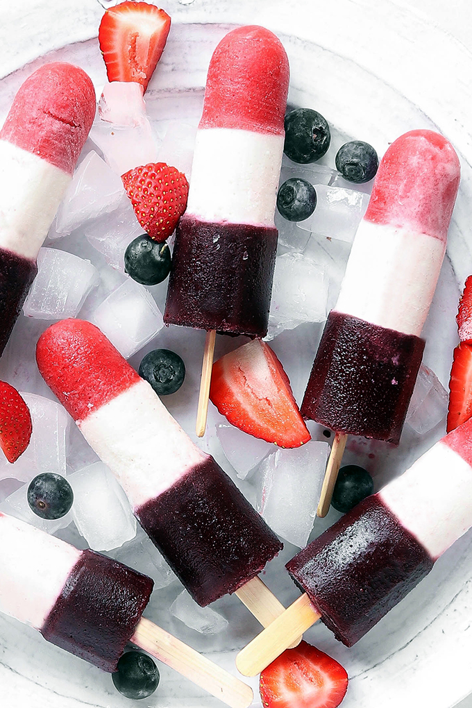 A new twist on an old classic, Homemade Red, White and Blue Bomb Pops are simple to make, requiring just a few real-food ingredients and NO cooking. Perfect for Summer night celebrations and get-togethers.