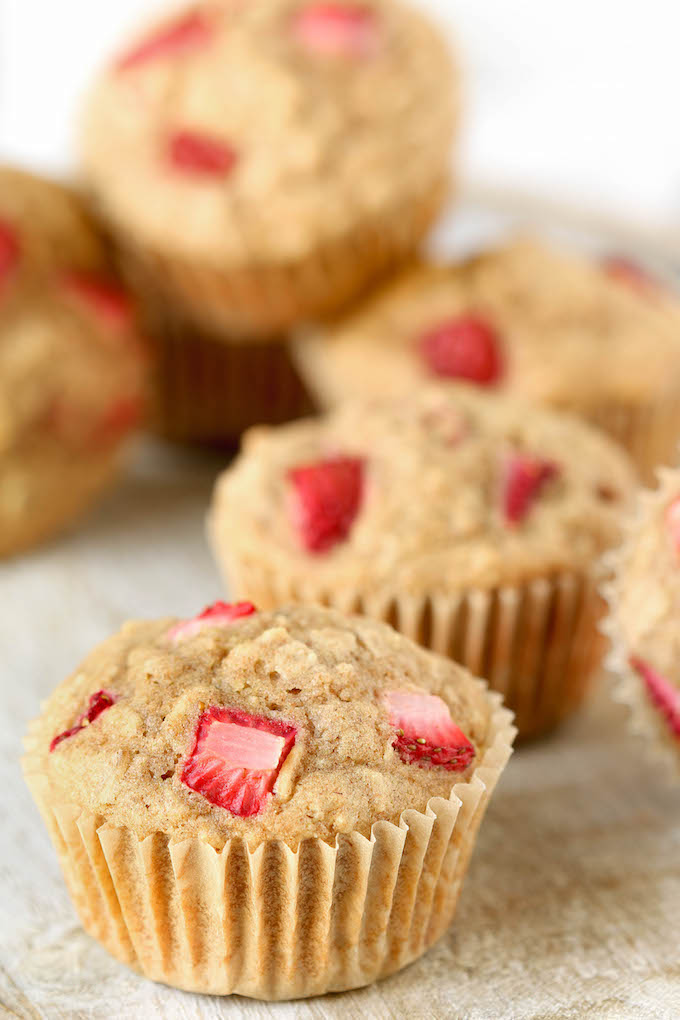 Thick n' fluffy, perfectly sweet Strawberry Oatmeal Muffins are flavorful and naturally sweetened. The perfect grab n' go breakfast or snack!