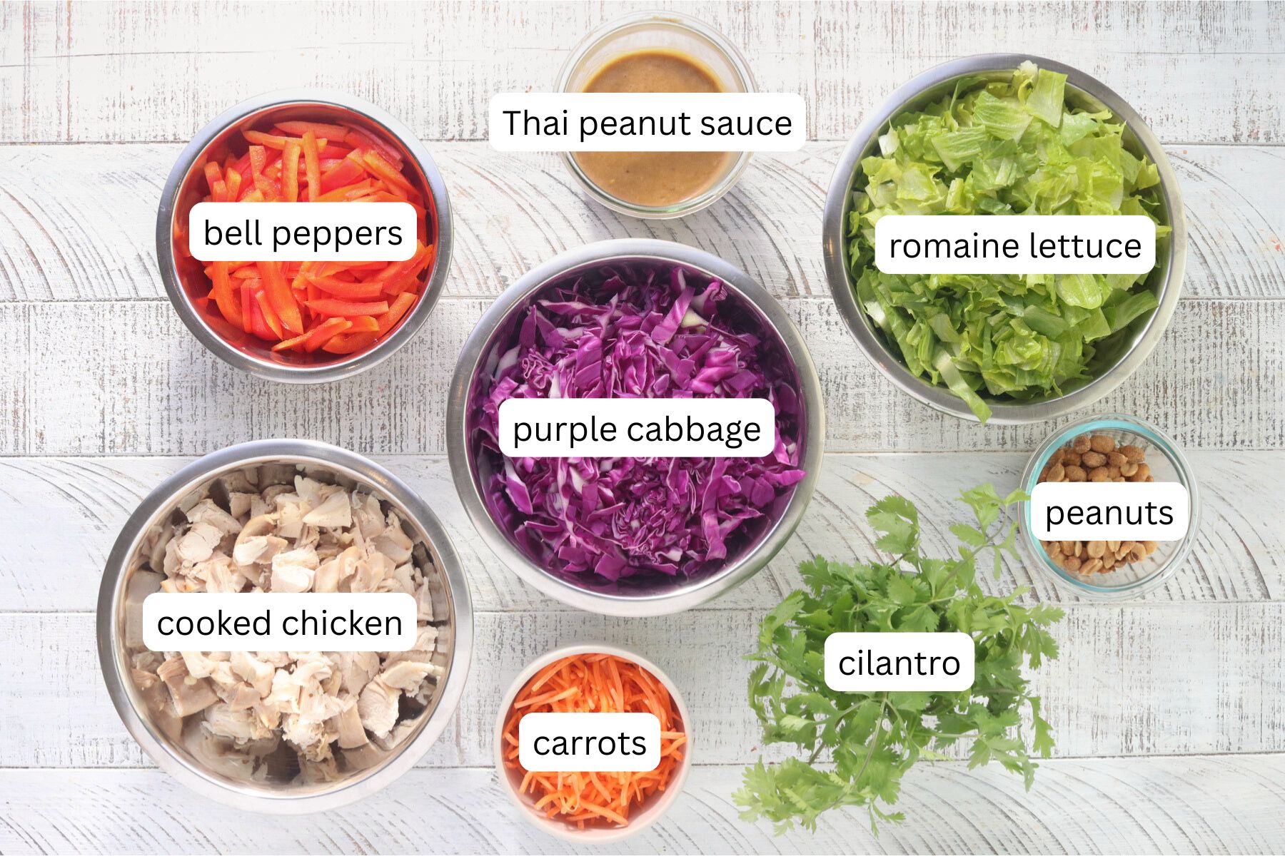 Rotisserie chicken: Any cooked shredded chicken can replace it. Leftover grilled or baked chicken is great, and even canned chicken will do in a pinch.
Purple cabbage: Napa cabbage, green cabbage or a bag of coleslaw mix are easy swaps.
Romaine: Butter lettuce or iceberg are good alternatives.
Carrots: I usually buy the pre-shredded carrots from the produce section. If you don’t have them, thinly sliced sugar snap peas or extra bell pepper add similar crunch.
Bell pepper: Try thinly sliced cucumber or snap peas.
Cilantro: If you’re not a fan, skip it or substitute sliced green onions or fresh mint.
Peanuts: Cashews or sliced almonds are easy swaps. For a nut-free option, use sunflower seeds or crispy wonton strips.
Peanut butter: Almond butter or sunflower seed butter can be used instead.
Soy sauce: Tamari or coconut aminos can be used instead.
Lime juice: Rice vinegar or apple cider vinegar can replace it.
Honey: Maple syrup can be used in equal amounts. Brown sugar also works. Use about 2 teaspoons brown sugar for every 1 tablespoon honey and add a splash of warm water to help it dissolve.