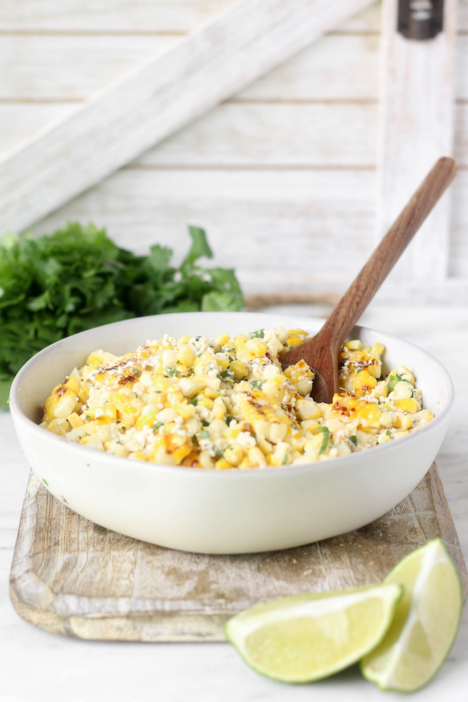 This Mexican Street corn salad is smoky, spicy, tangy and simple to throw together. A fun twist on the Mexican street vendor version of corn on the cob!