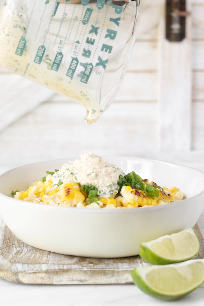 This Mexican Street corn salad is smoky, spicy, tangy and simple to throw together. A fun twist on the Mexican street vendor version of corn on the cob!