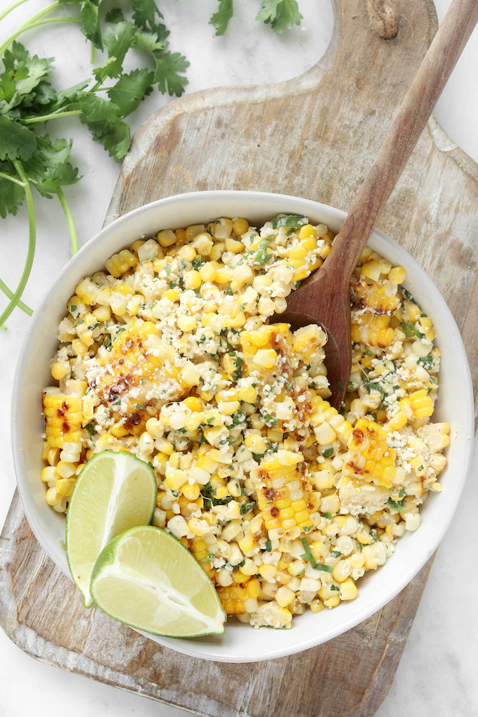 This Mexican Street corn salad is smoky, spicy, tangy and simple to throw together. A fun twist on the Mexican street vendor version of corn on the cob!