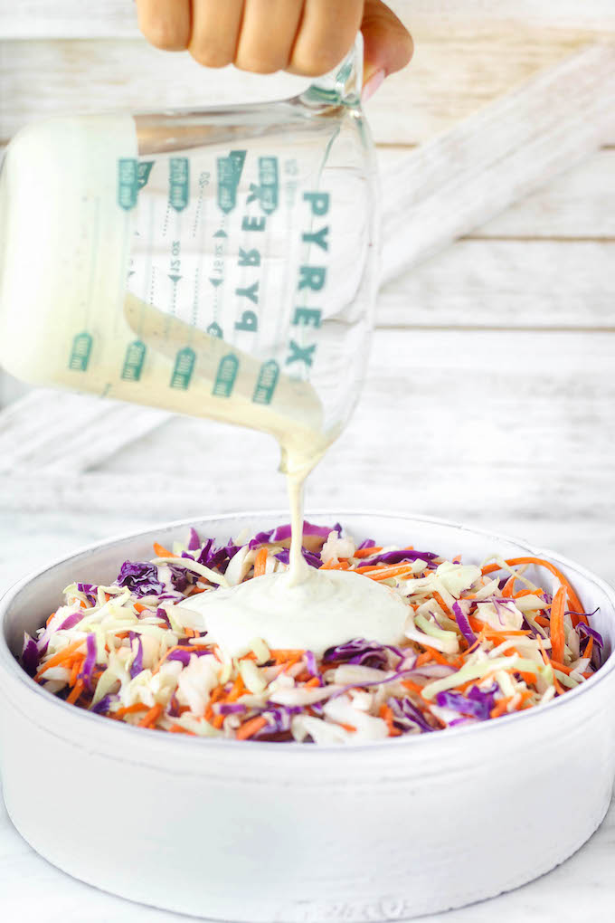 Lightened Up Homemade Coleslaw With Greek Yogurt in white bowl.