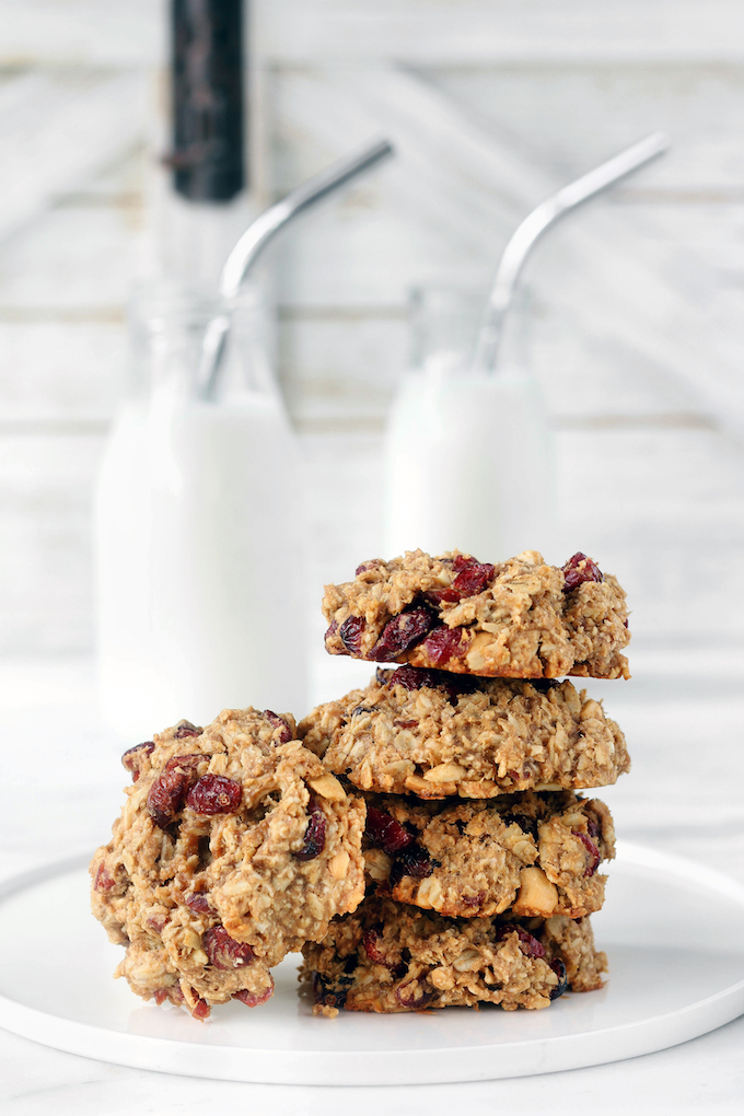 Four large Peanut Butter Oatmeal Breakfast Cookies sitting on a counter.