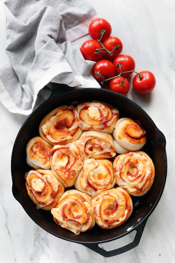 6-Ingredient Pizza rolls in a black cast iron skillet.