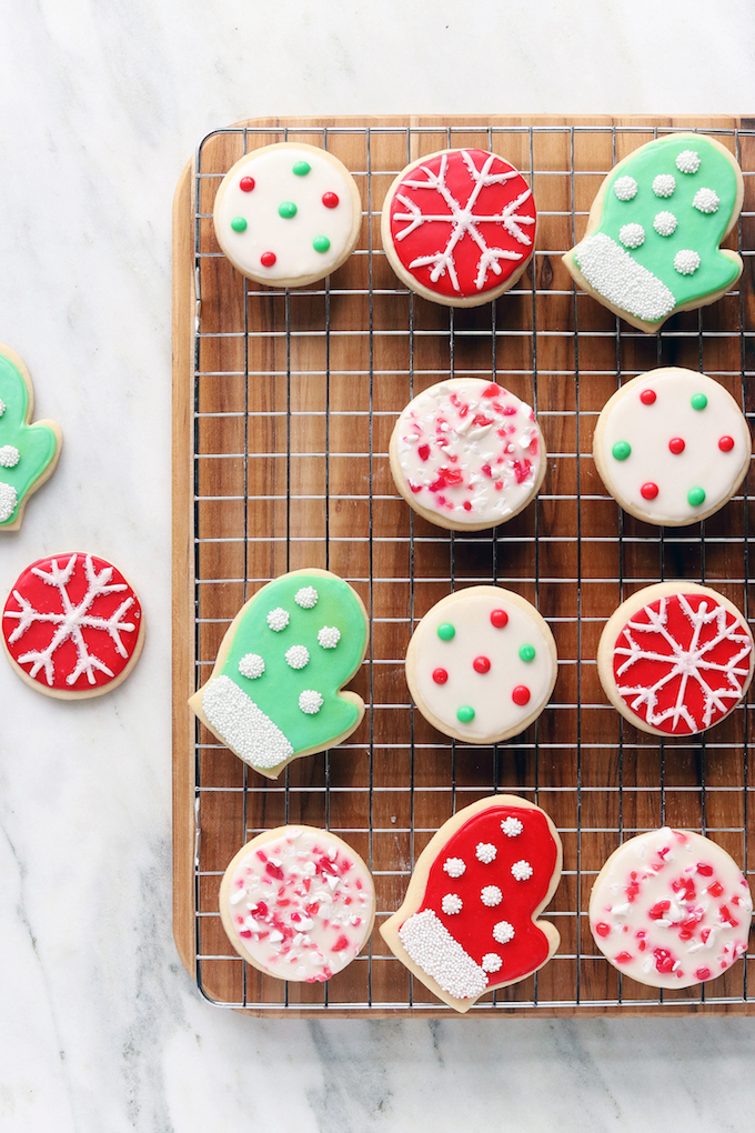 Naturally Dyed and Decorated Christmas Cookies on a cooling rack.