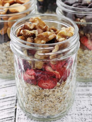 Instant Oat Jar filled with oats, freeze dried strawberries, pecans and chocolate chips.