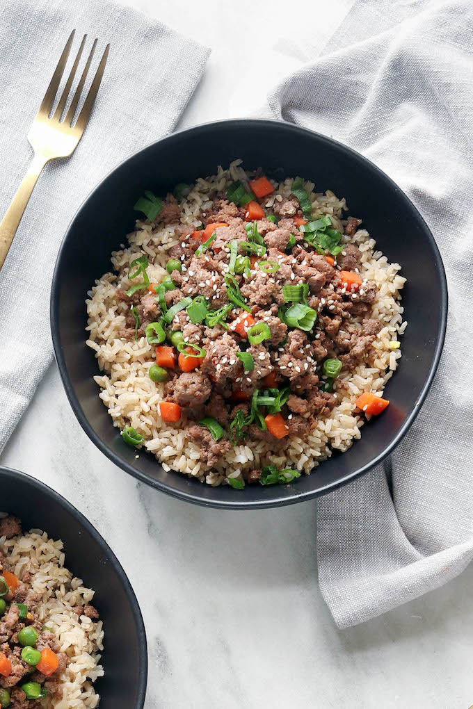 Quick Korean Beef Bowls on a white marble countertop.