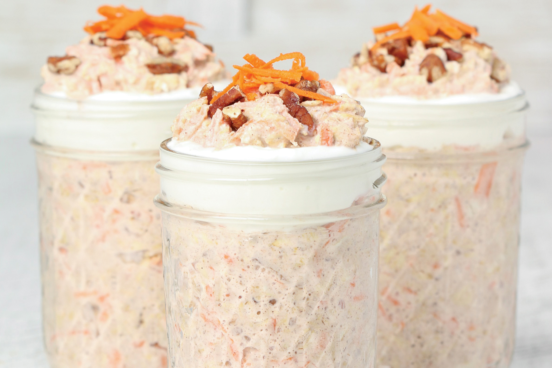 Step 4: Carrot Cake Overnight Oats - remove jars from refrigerator and add toppings.