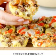Baked Egg Muffin being lifted into the air from a white plate.