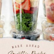 Strawberry, banana, spinach smoothie pack stored in a clear cup.